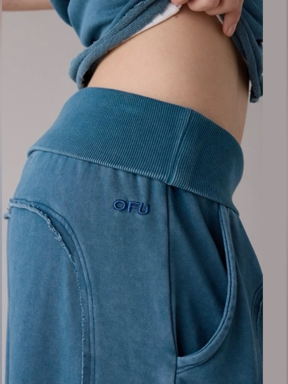 Out From Under Sweatpants - Picture 2 of 7